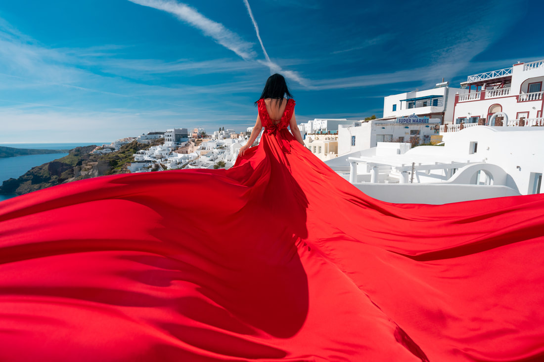 girl in Greece with red dress
